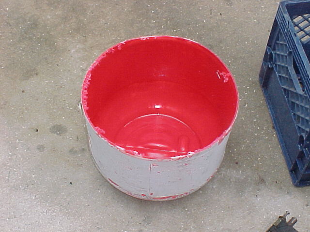 the plastic gas can cut off to make the muller tub.jpg